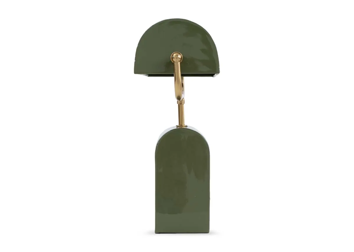 A  green table lamp with curved shell shade from EZ Livinngs Cardona range.  Side view
