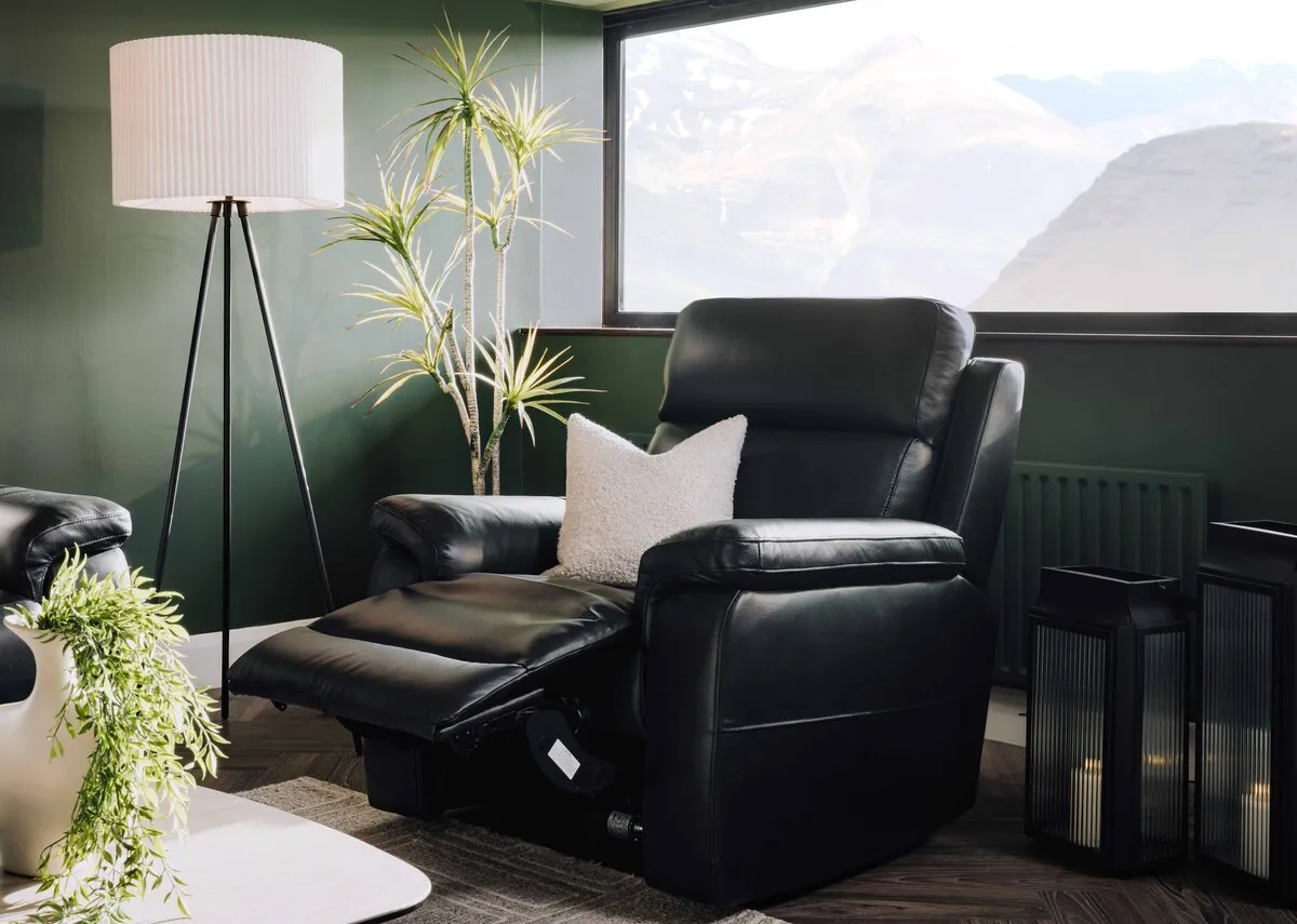 A lifestyle image of the Raven recliner with Starlette lamp and lanterns
