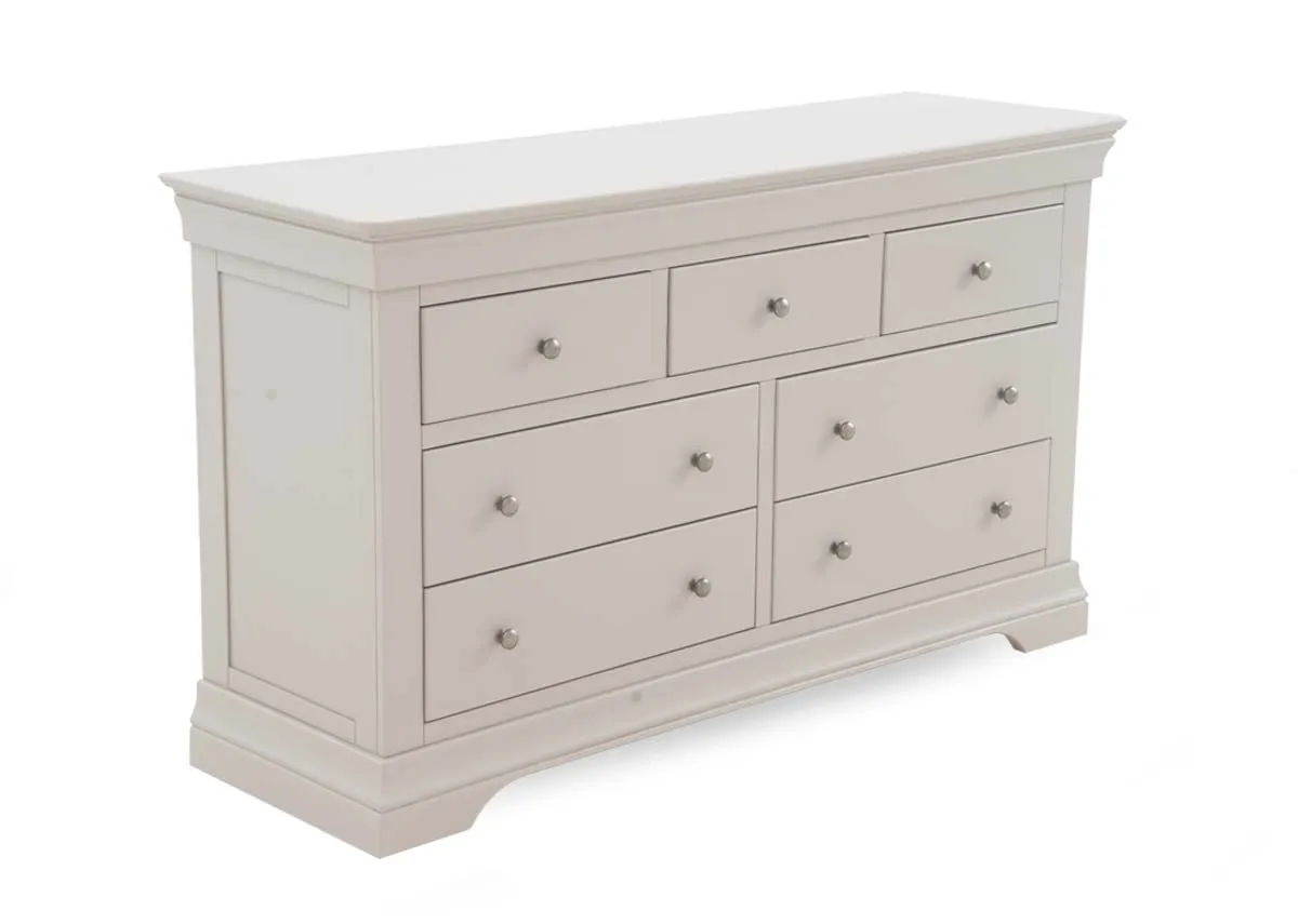 A 7 drawer taupe dresser from EZ Livings Dove range. Angled view.