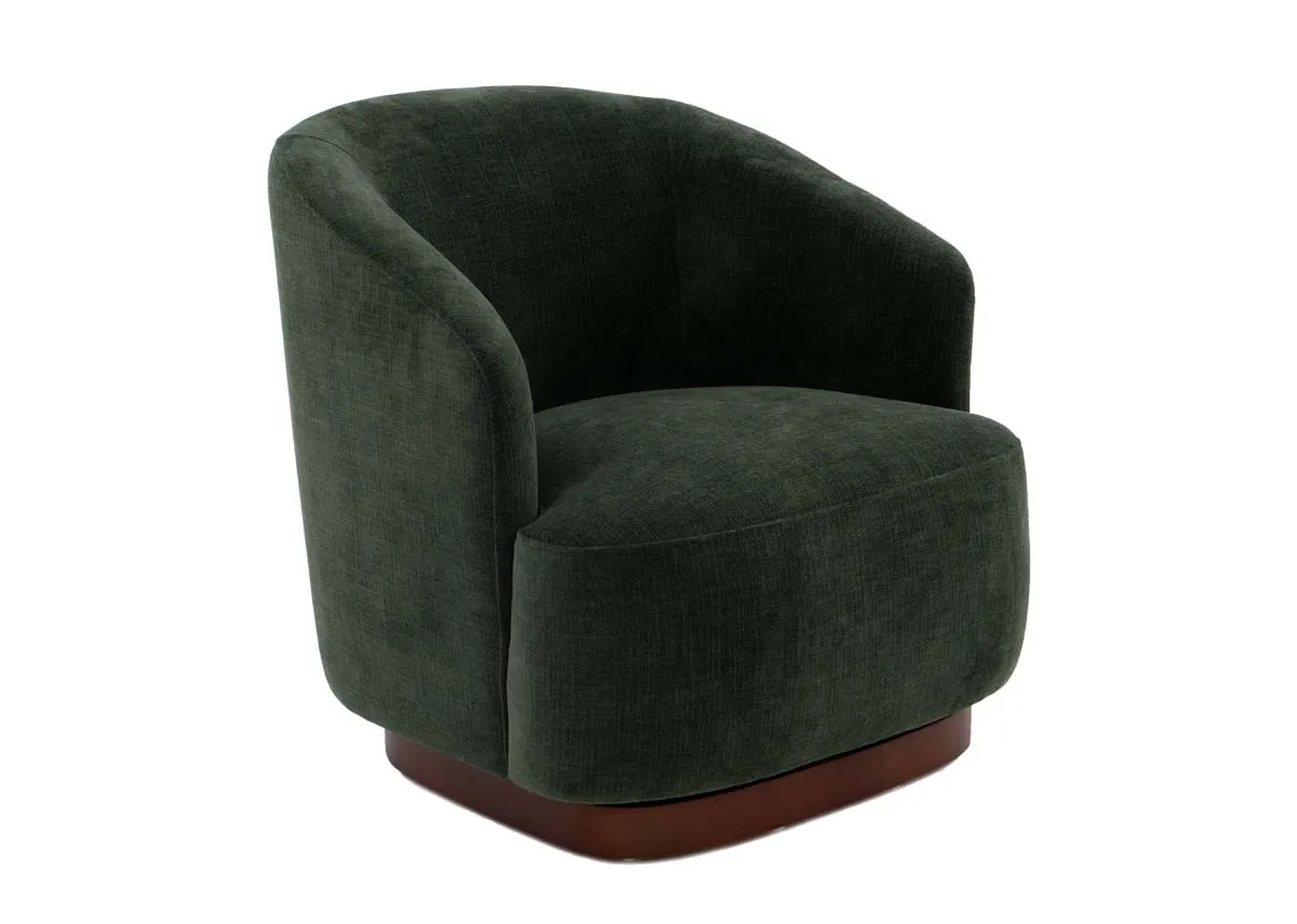 An arched back swivel chair from EZ Livings Dalton range. Angled view of chair in forest green