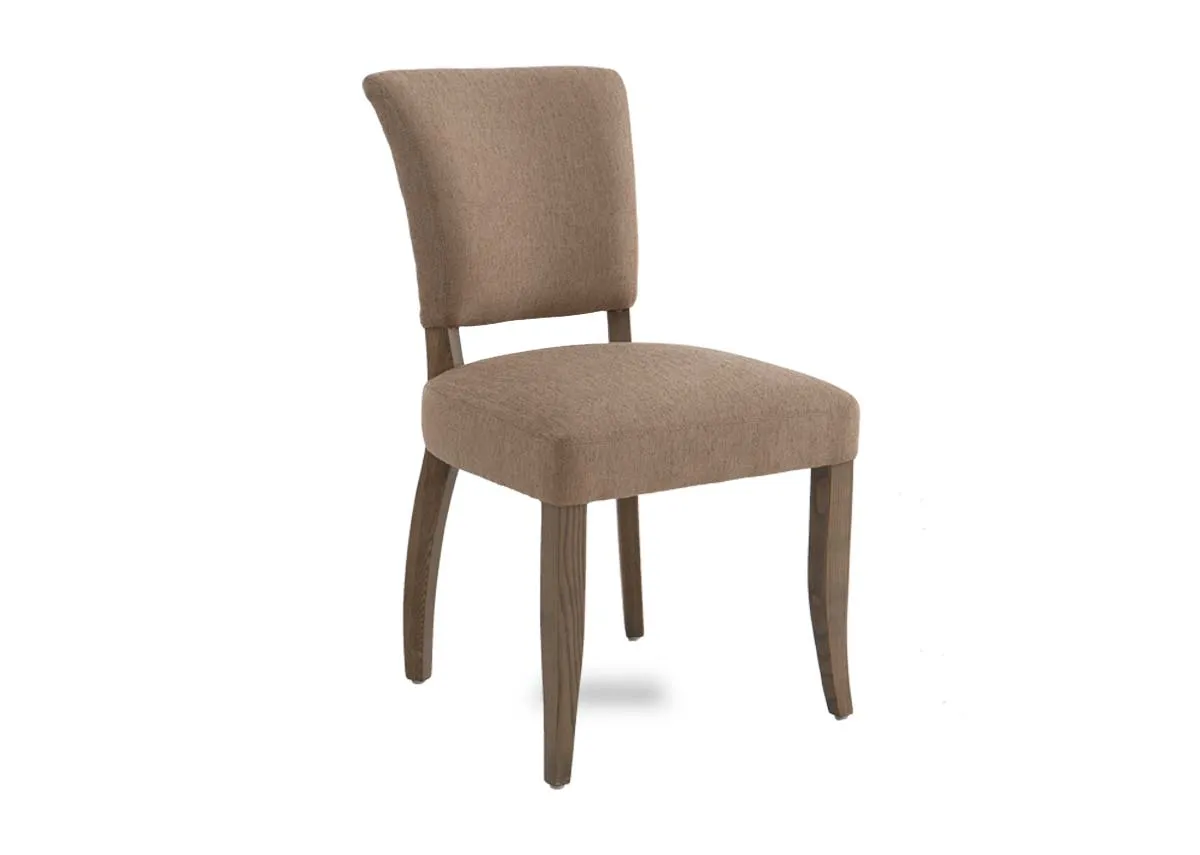 A beige fabric dining chair from EZ Livings Geneva range. Angled view