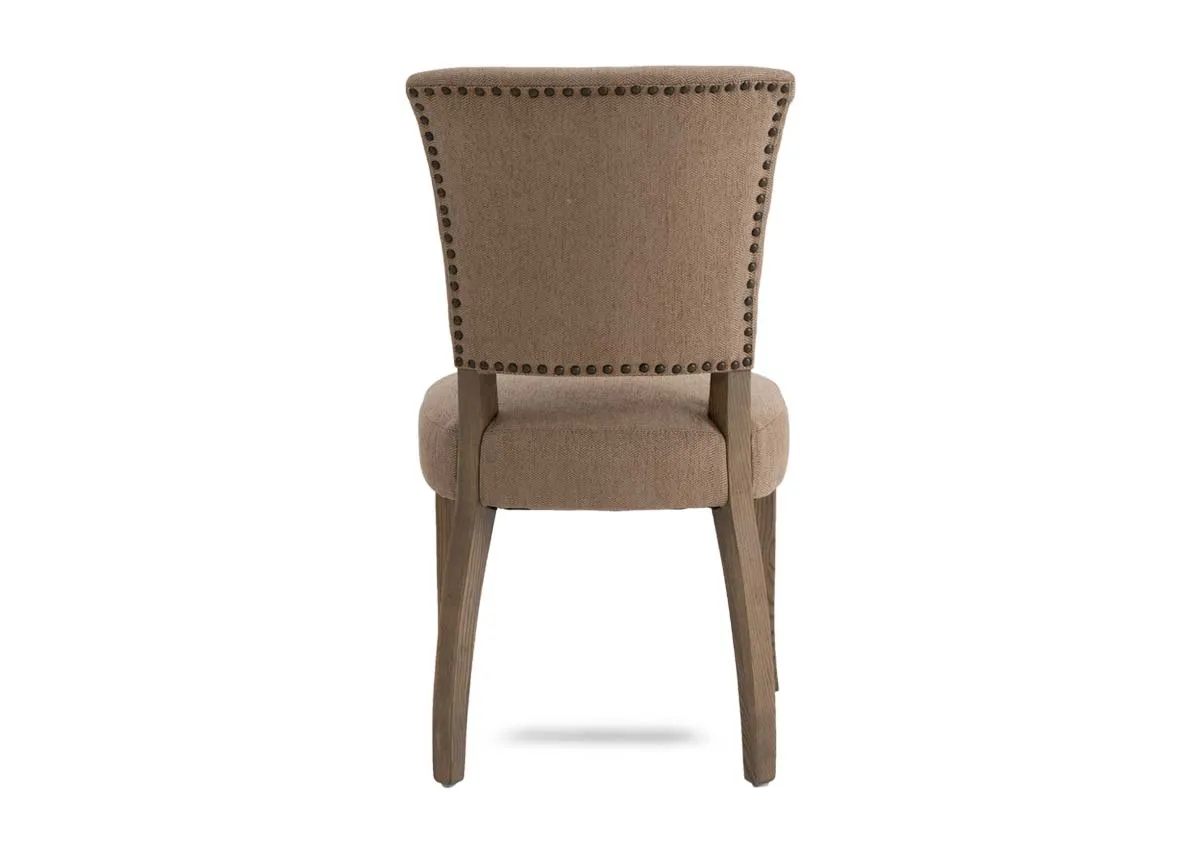 A beige fabric dining chair from EZ Livings Geneva range. Back view