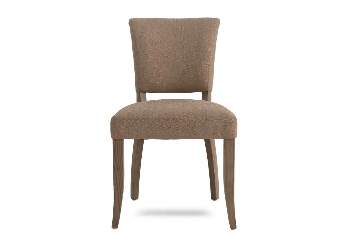 A beige fabric dining chair from EZ Livings Geneva range. Front veiw of ash wood legs and frame