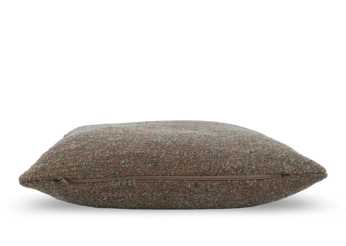 A copper green fabric cushion from EZ Livings Zari range. Side view of feather filled cushion