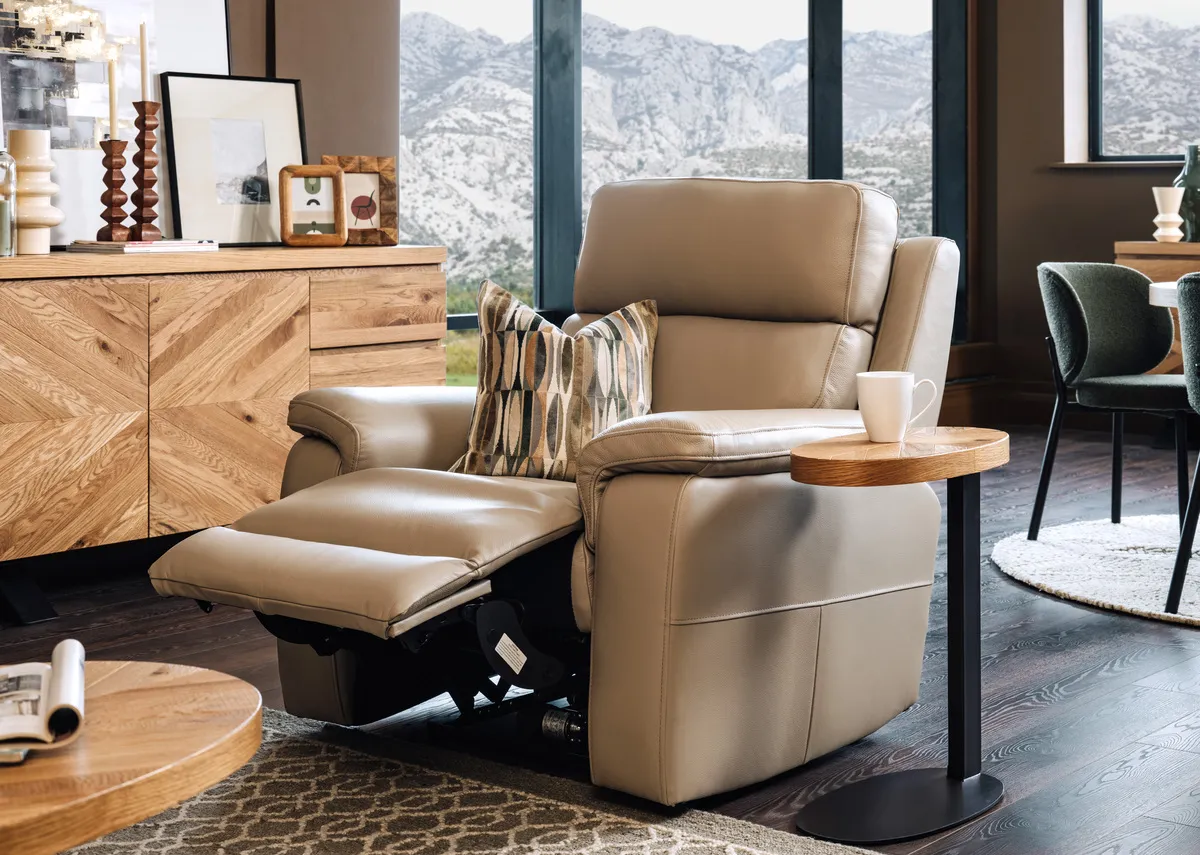 A lifestyle image of the Raven reclined with Ellipse sideboard.