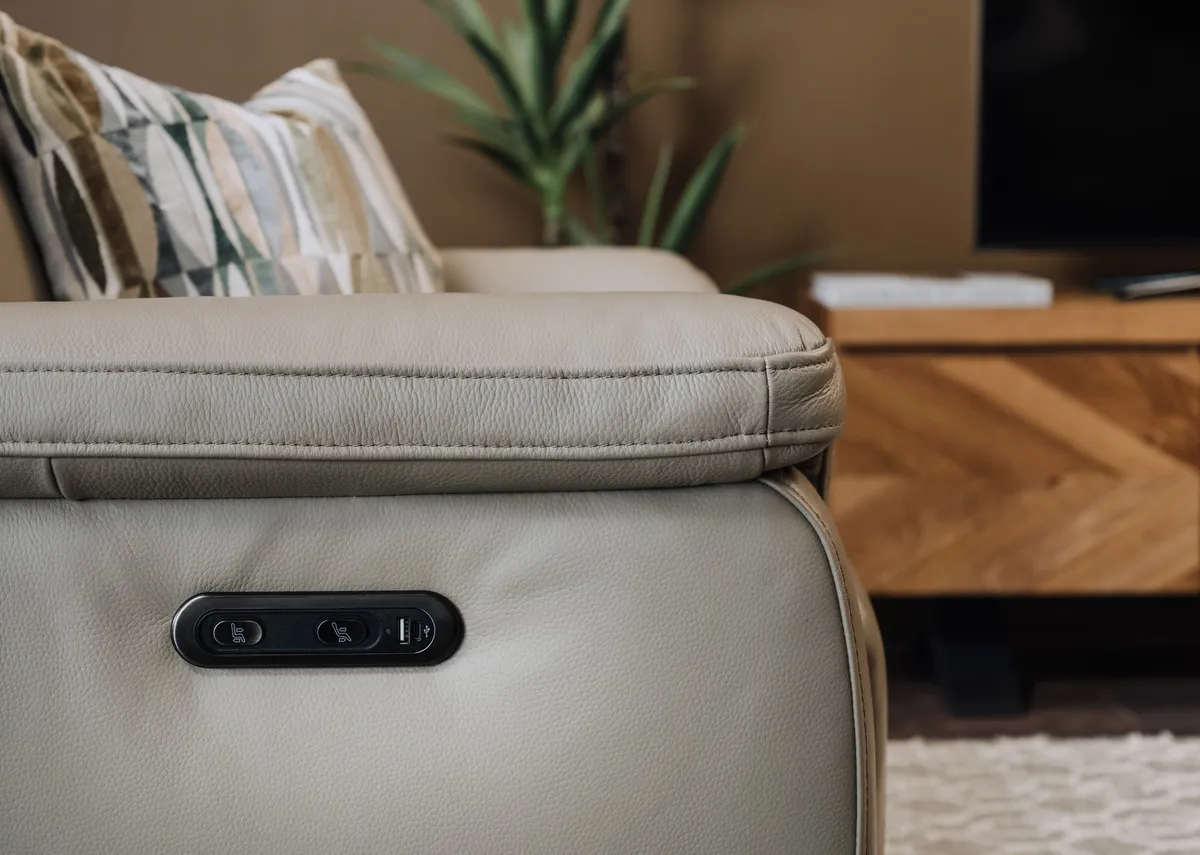 A closeup of the remote for the leather power reclining sofa from EZ Livings Raven range. Closeup of the usb charging port