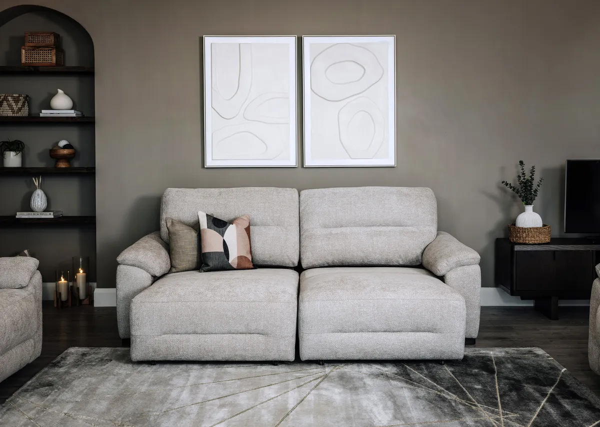 A lifestyle image of the Annalee 3 seater with 1 side of chaise out with Gateway canvas and Rimini tables.