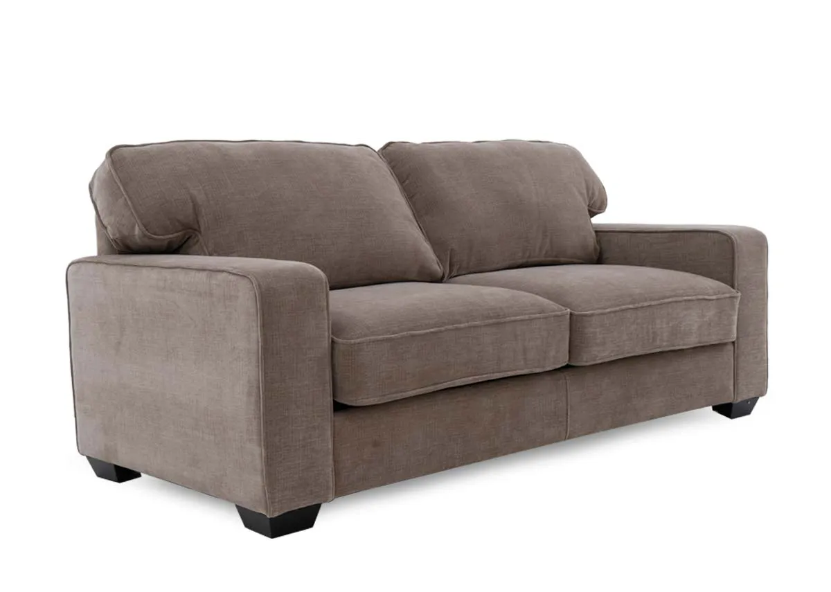 A beige fabric sofa from EZ Living Furnitures Nevada range. Angled view of sofa.