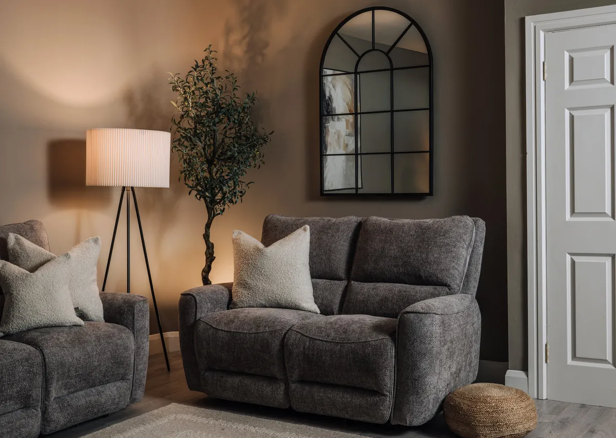 A grey 2 seater with power reclining functions from EZ Livings Ashbrook range. Closeup of usb port on inside of armrest