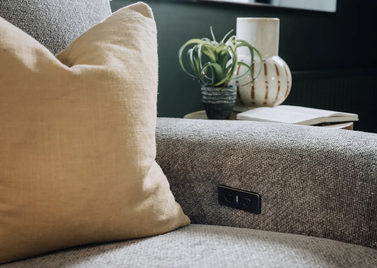 A lifestyle image of the Ashbrook corner sofa with the Pathways picture.