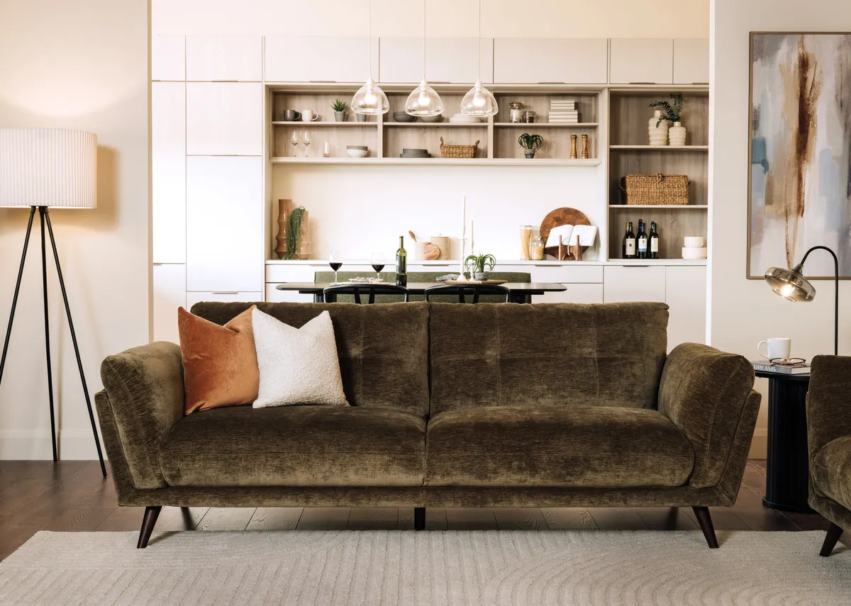 A lifestyle image of the Toscana 2 seater sofa with Starlette lamp and Inspired canvas.