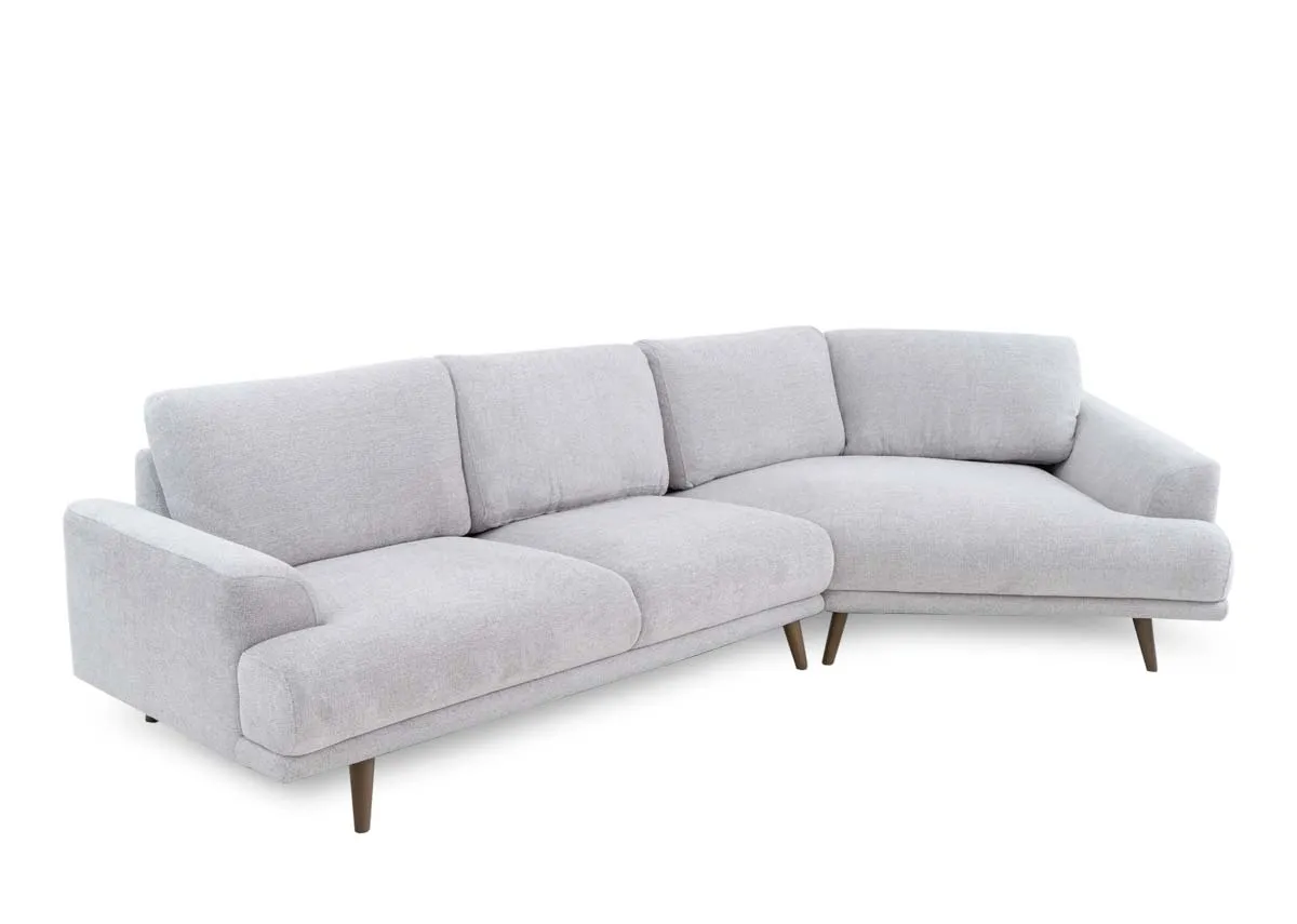 A stone grey corner sofa from EZ Livings Legend range. Angled view of plush grey fabric