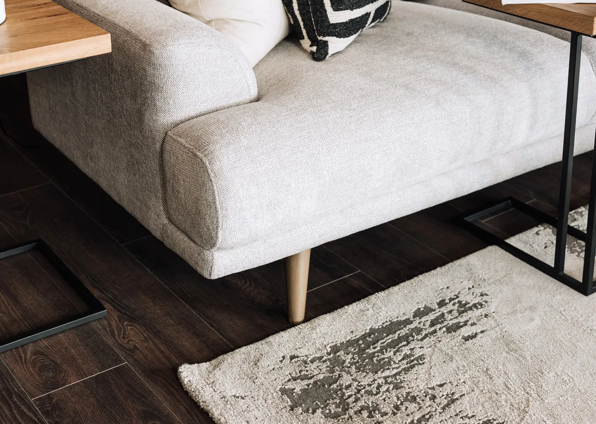 A stone grey corner sofa from EZ Livings Legend range.Side view of armrest on 2.5 seater