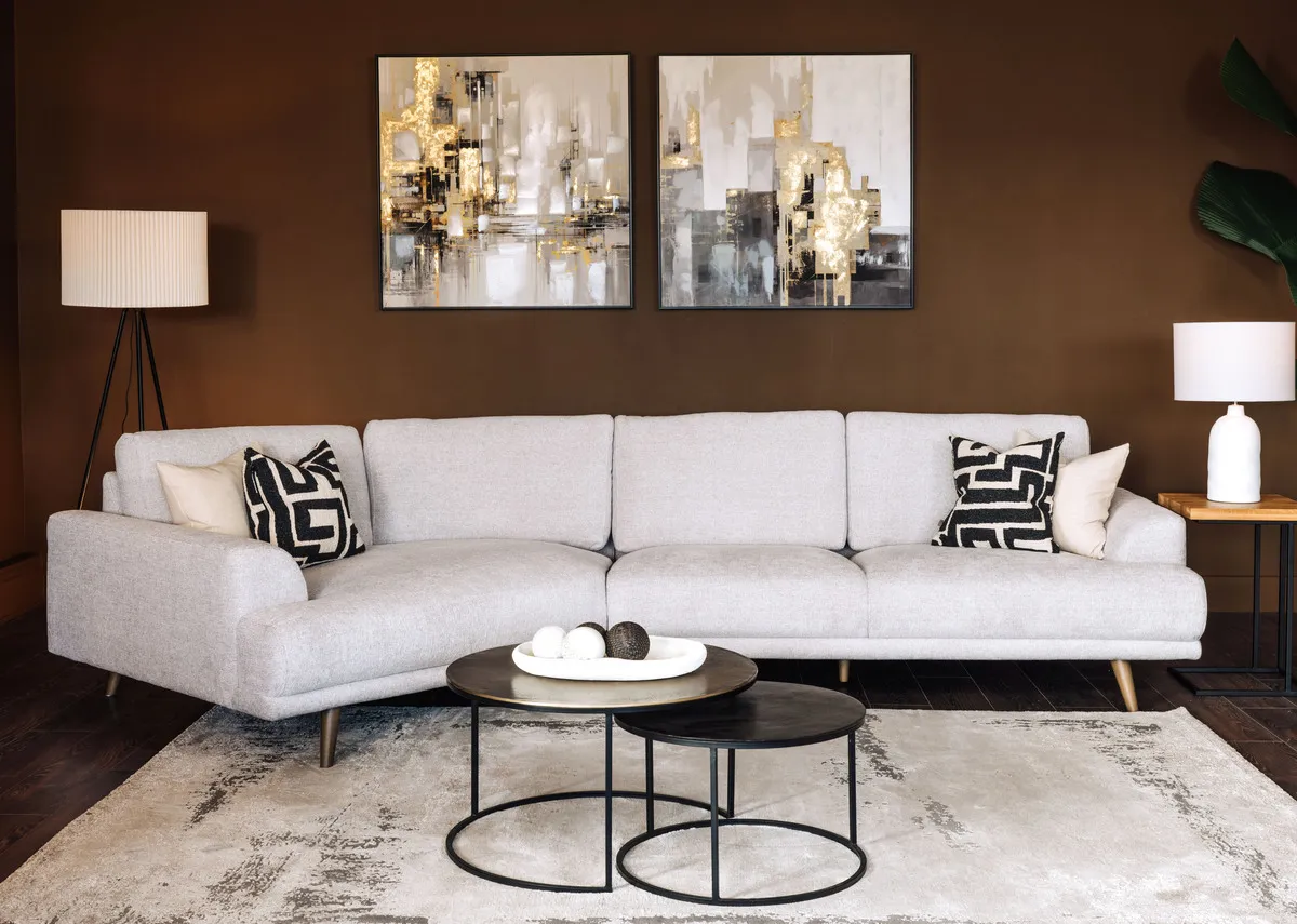 A stone grey corner sofa from EZ Livings Legend range.Angled view