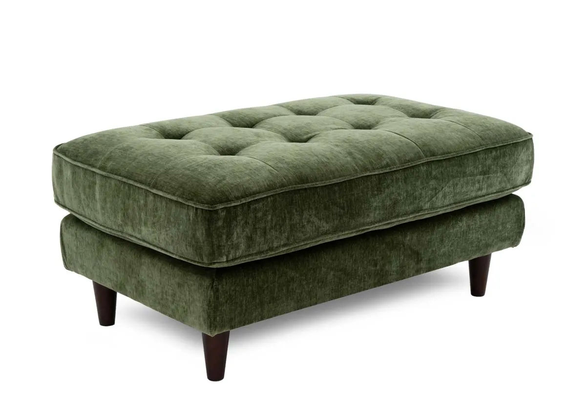 A green bfabric footstool from EZ Livings Genoa range. Angled view of padded rectanngular seat cushion.