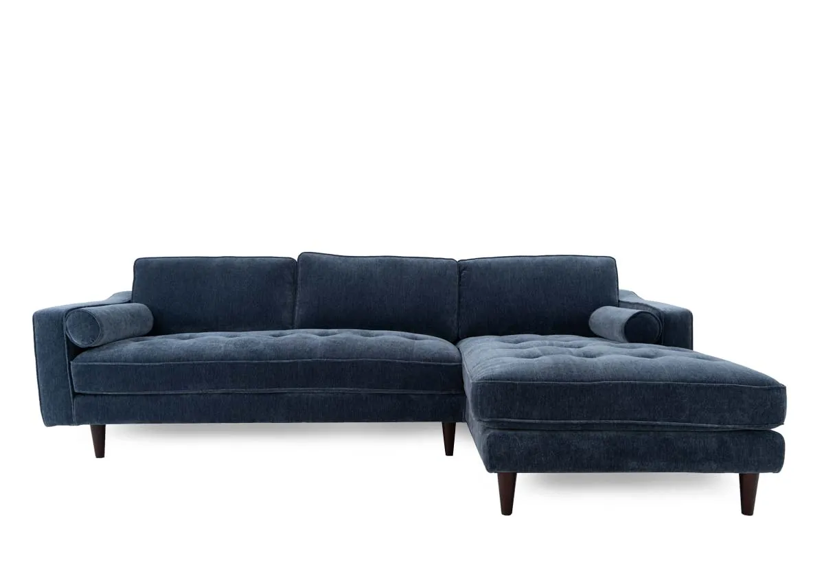 A blue fabric rhf sofa chaise from EZ Livings Genoa range. Front view of dark tapered feet