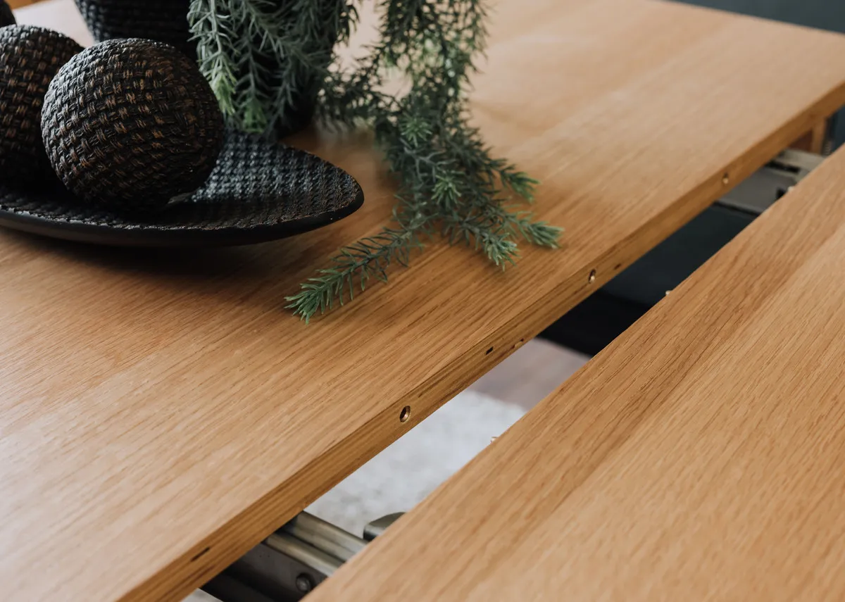 A lifestyle image of the Anton dining table with extension