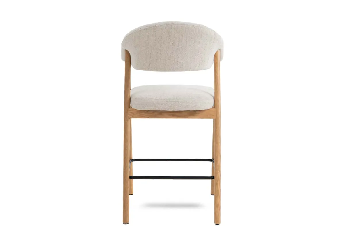 A natural oak framed counter stool with cream fabric backrest and padded seat from EZ Livings Elk range.Back view shows high quality finish