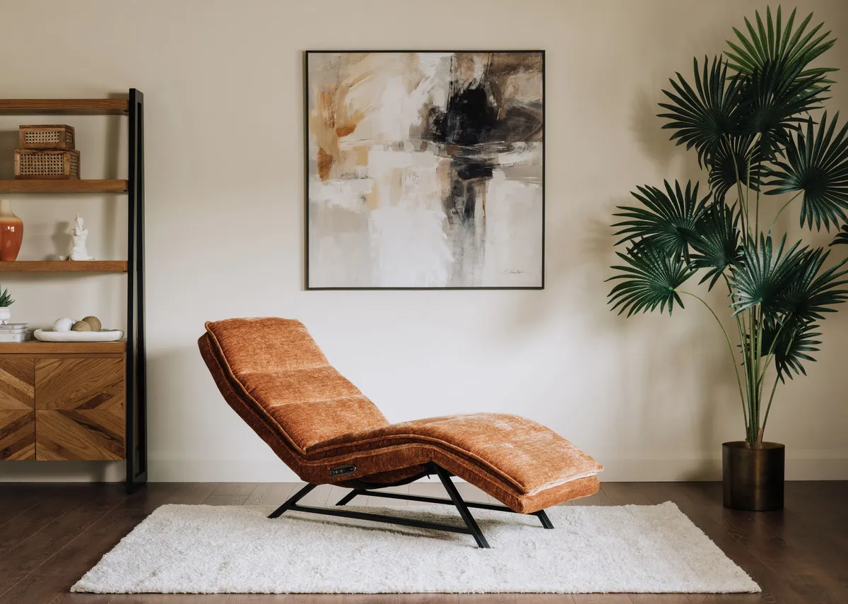 A lifestyle image of the Carson recliner lying flat under the Evocative print.
