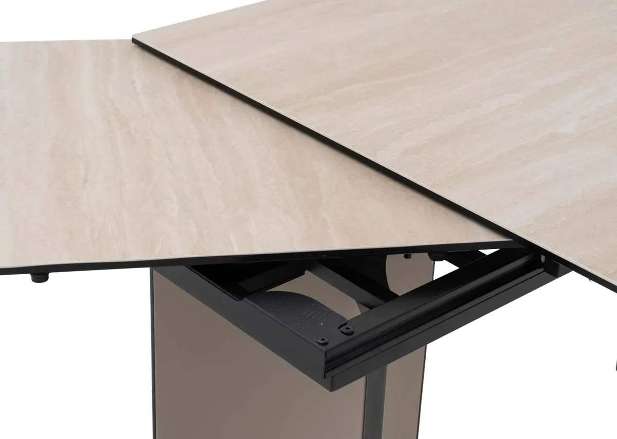 A lifestyle of the Turin extendable dining table with a closeup of the travertine table top