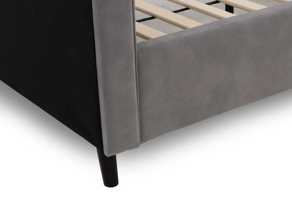 A light grey fabric bedframe from EZ Living Furniture. Closeup of leg