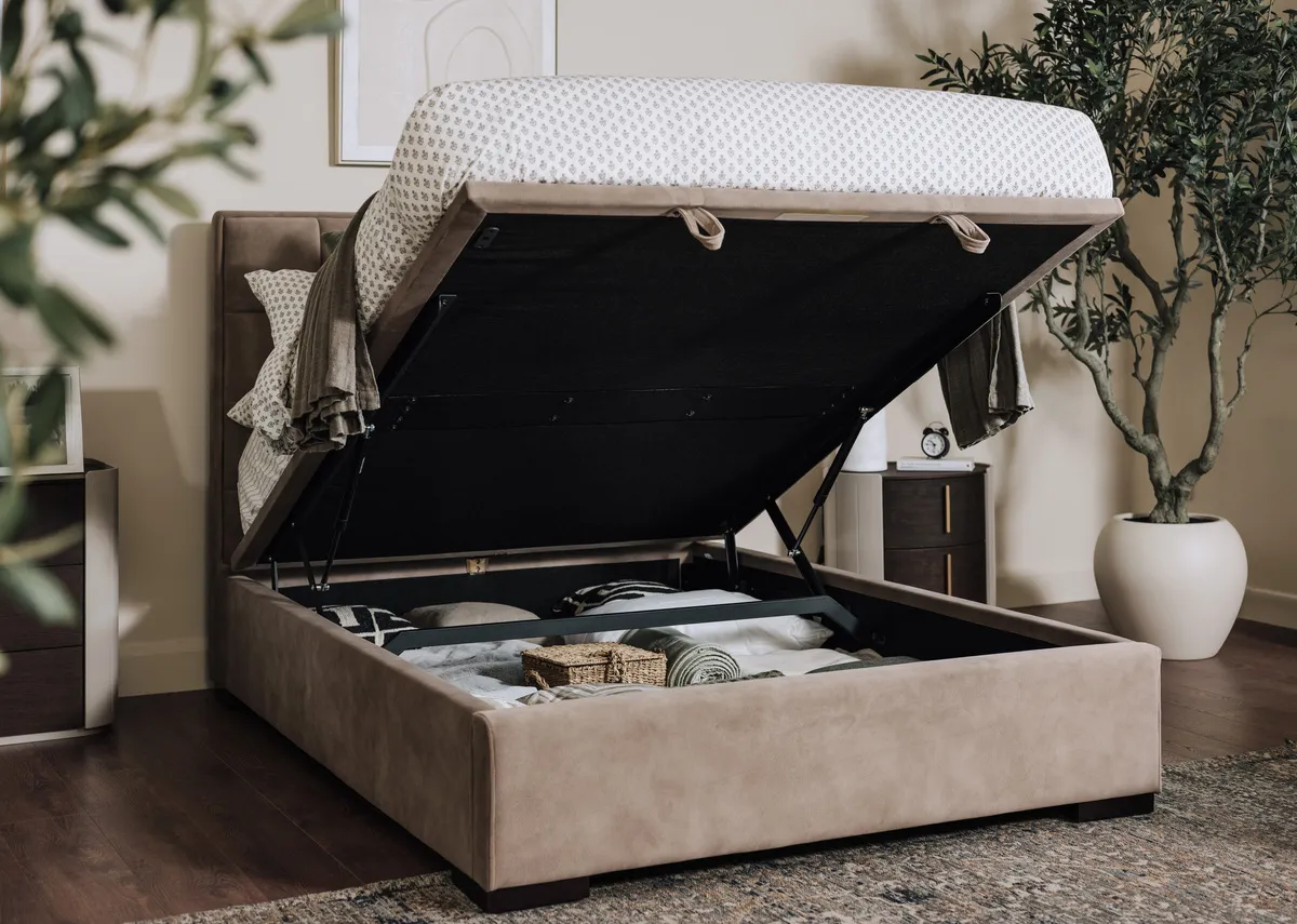 A lifestyle image of the Sadie Ottoman with storage displayed with Bunton chest and locker.