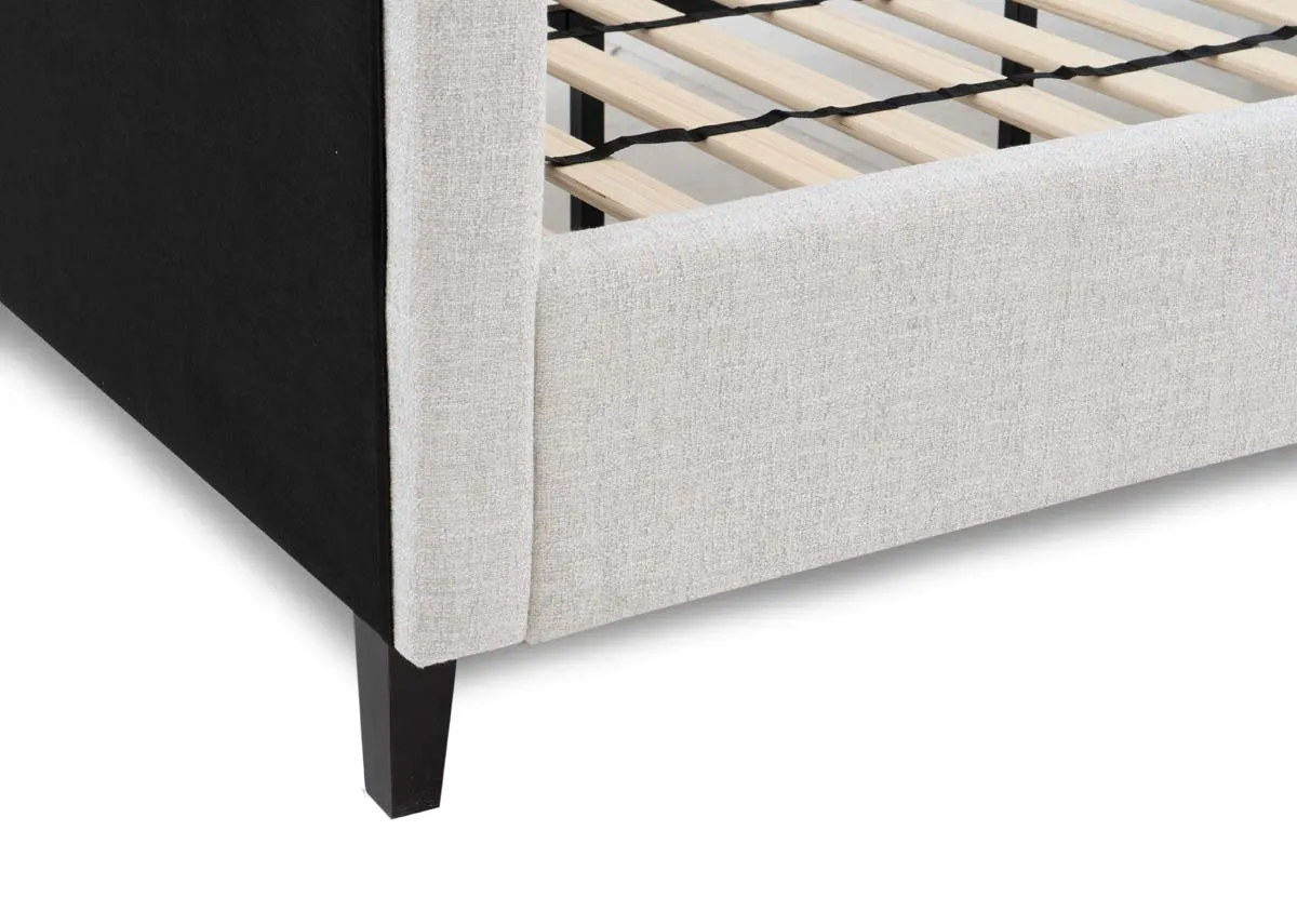A 4ft6 double bedframe with a closeup on dark rubber wood feet.