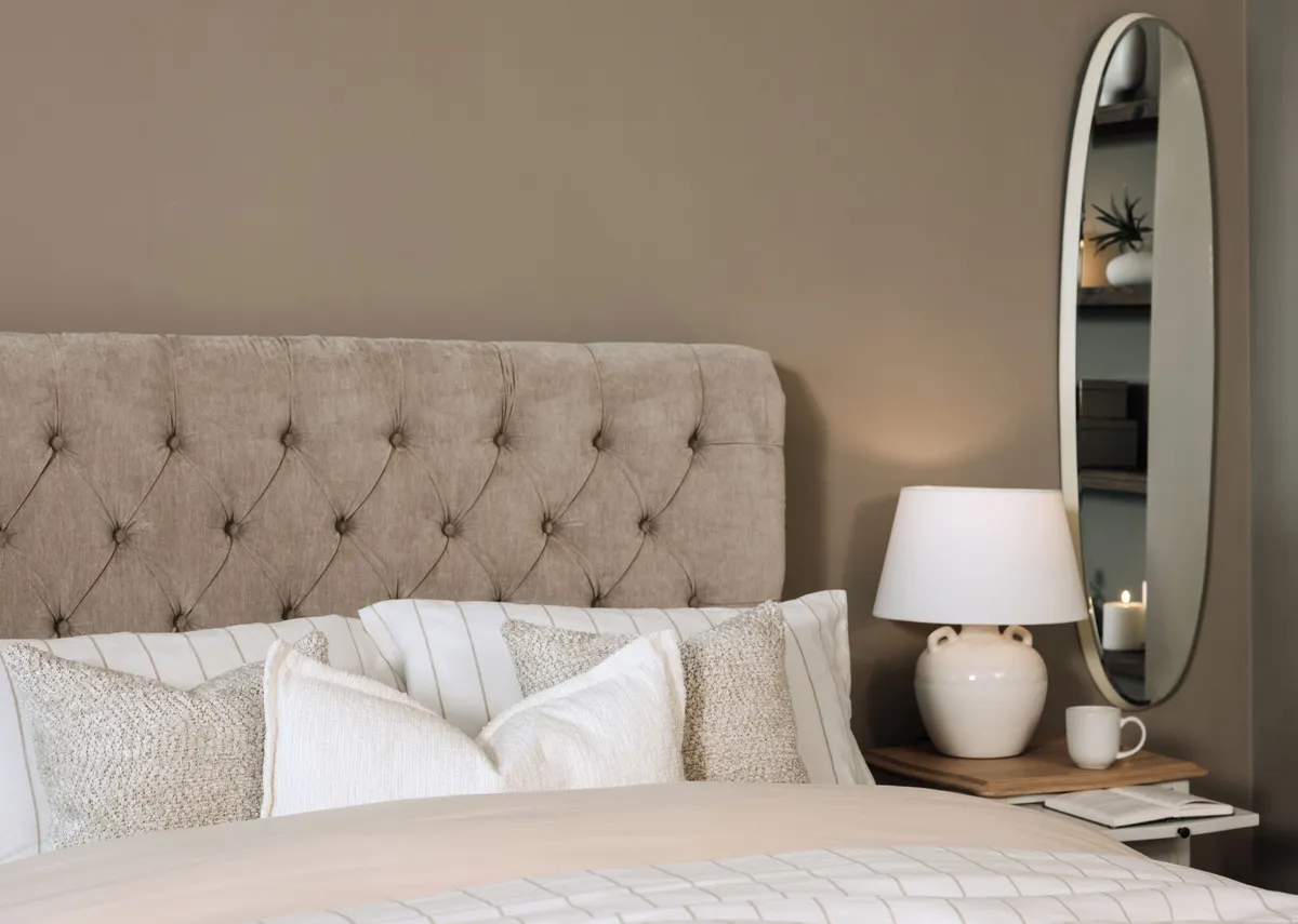 A lifestyle image of the tufted headboard detail on the Sofia bedframe.