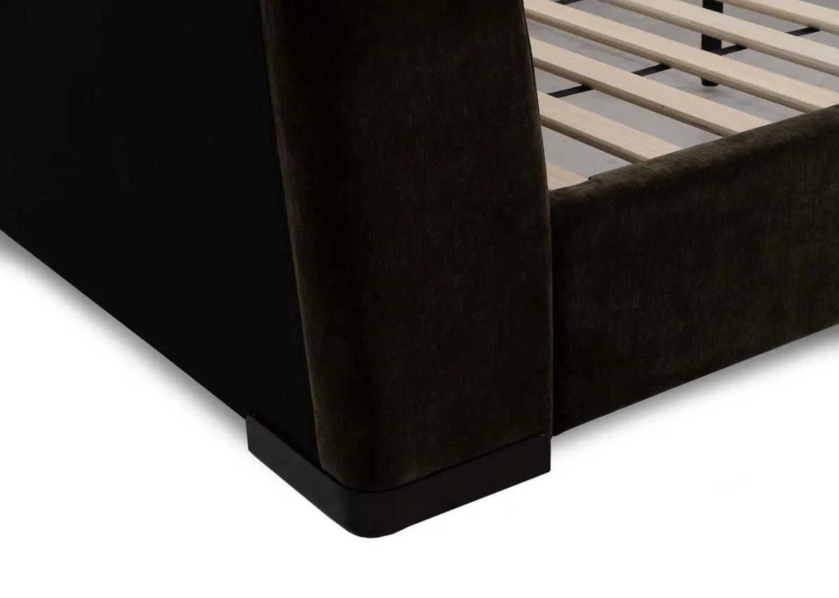 A green fabric bedframe with padded headboard from EZ Livings Comfy range. Closeup of velvet fabric and flat base