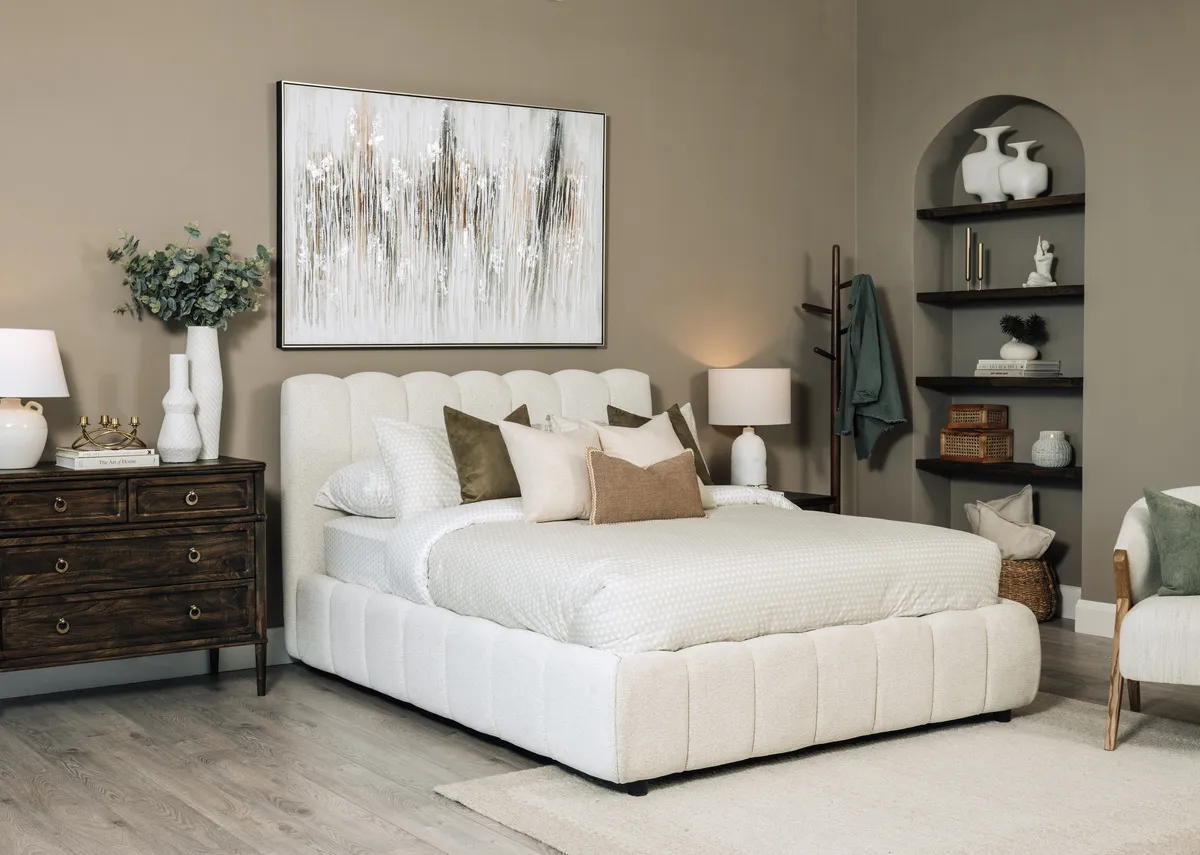 A lifestyle image of the Julia Bedframe with Tones pictrue and Hanover dresser with locker.