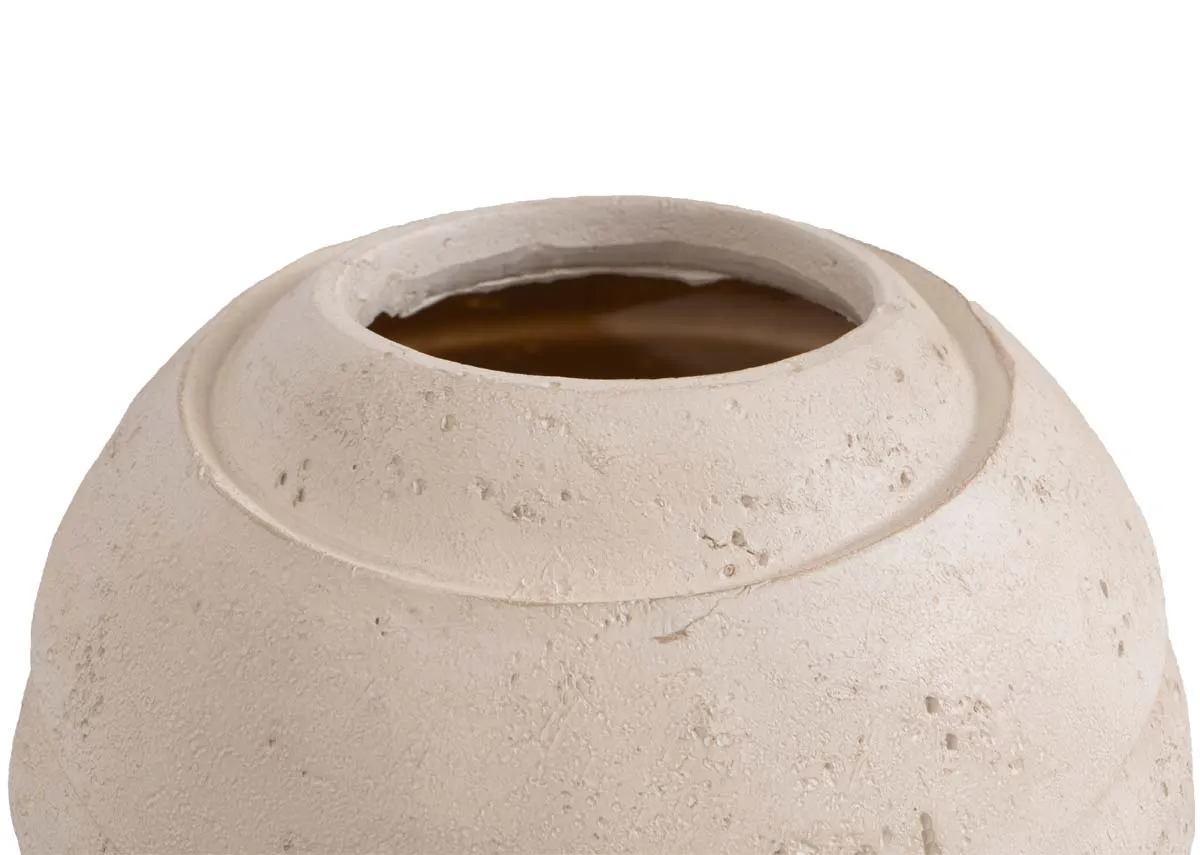 A natural resin vase with layered texture from EZ Livings Scupt vase. Closeup view of resin finish.