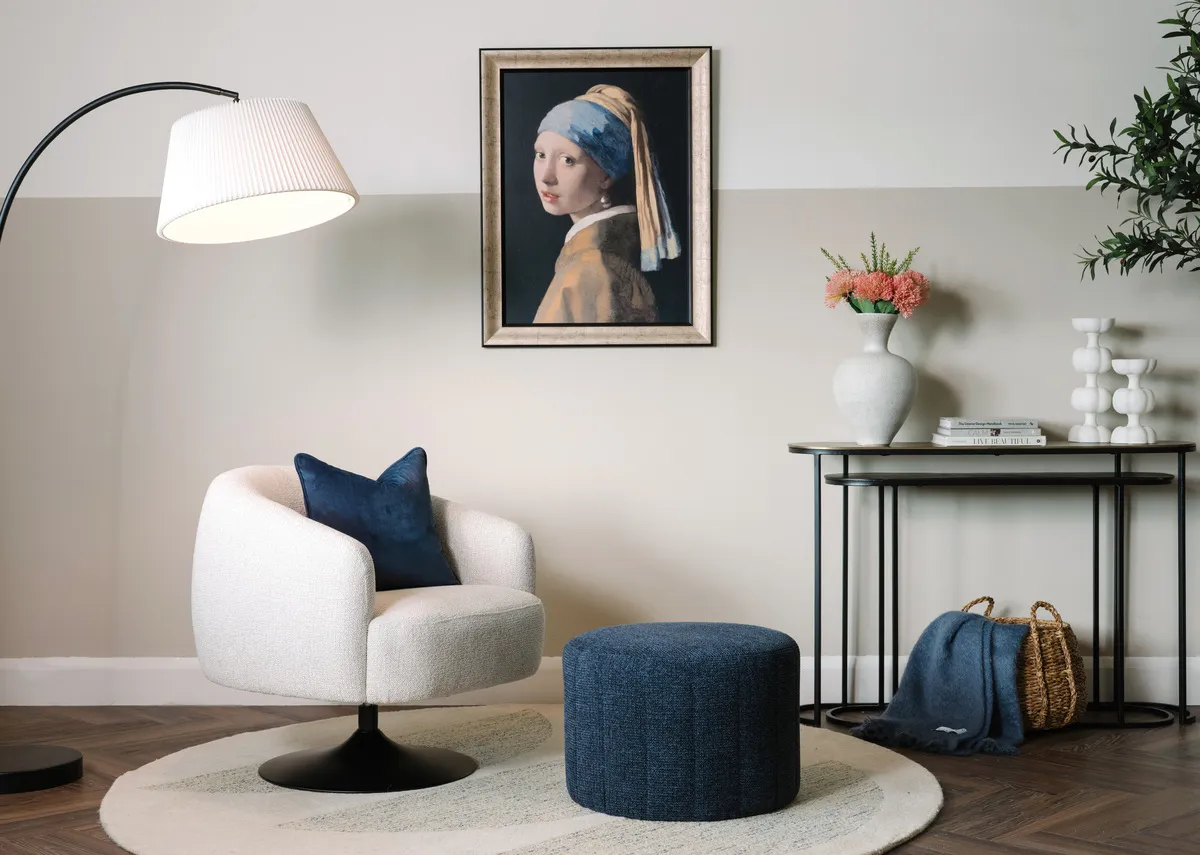 A lifestyle image of the Alexo pouffee with the Fusion swivel with a selection of accessories from EZ Living Furniture.