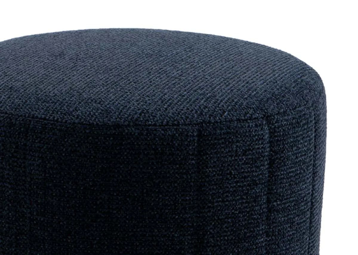 A round navy fabric footstool from EZ Livings Alexo range.Closeup of textured fabric