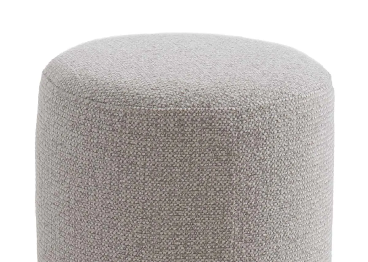 A cylindrical light grey fabric footstool from EZ Livings Parker range. Closeup of textured
