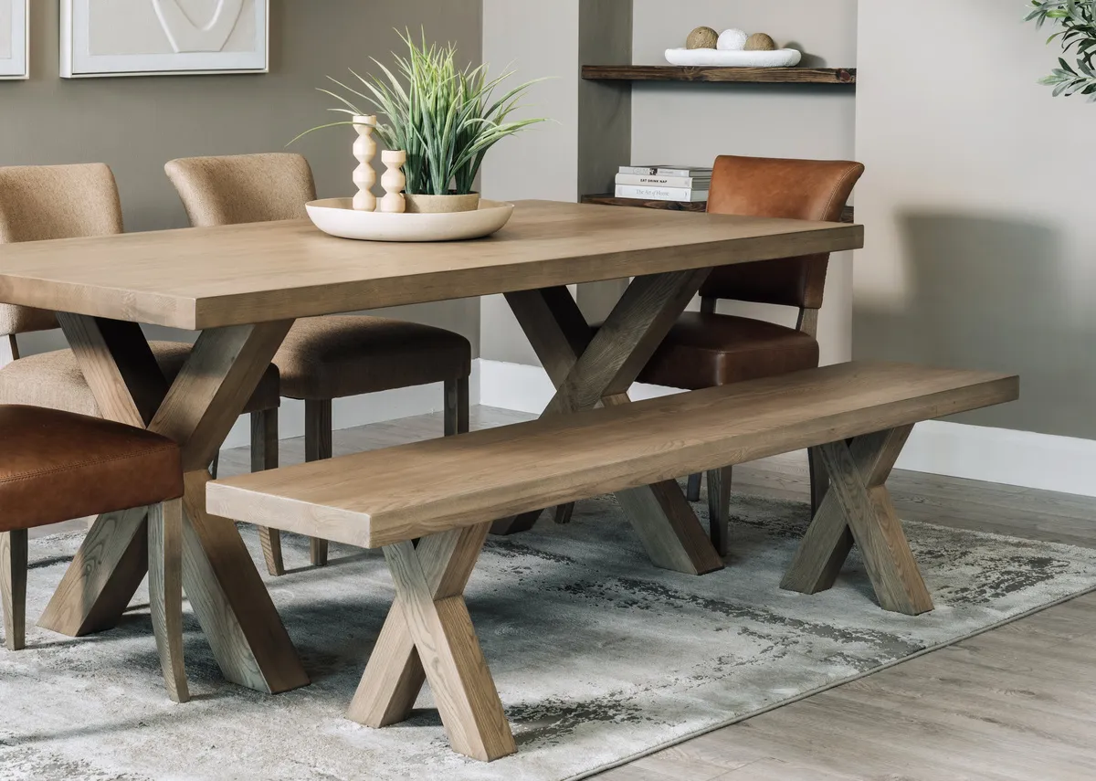 A lifestyle image of the Genva dining  bench with dining table and chairs with Kylo rug