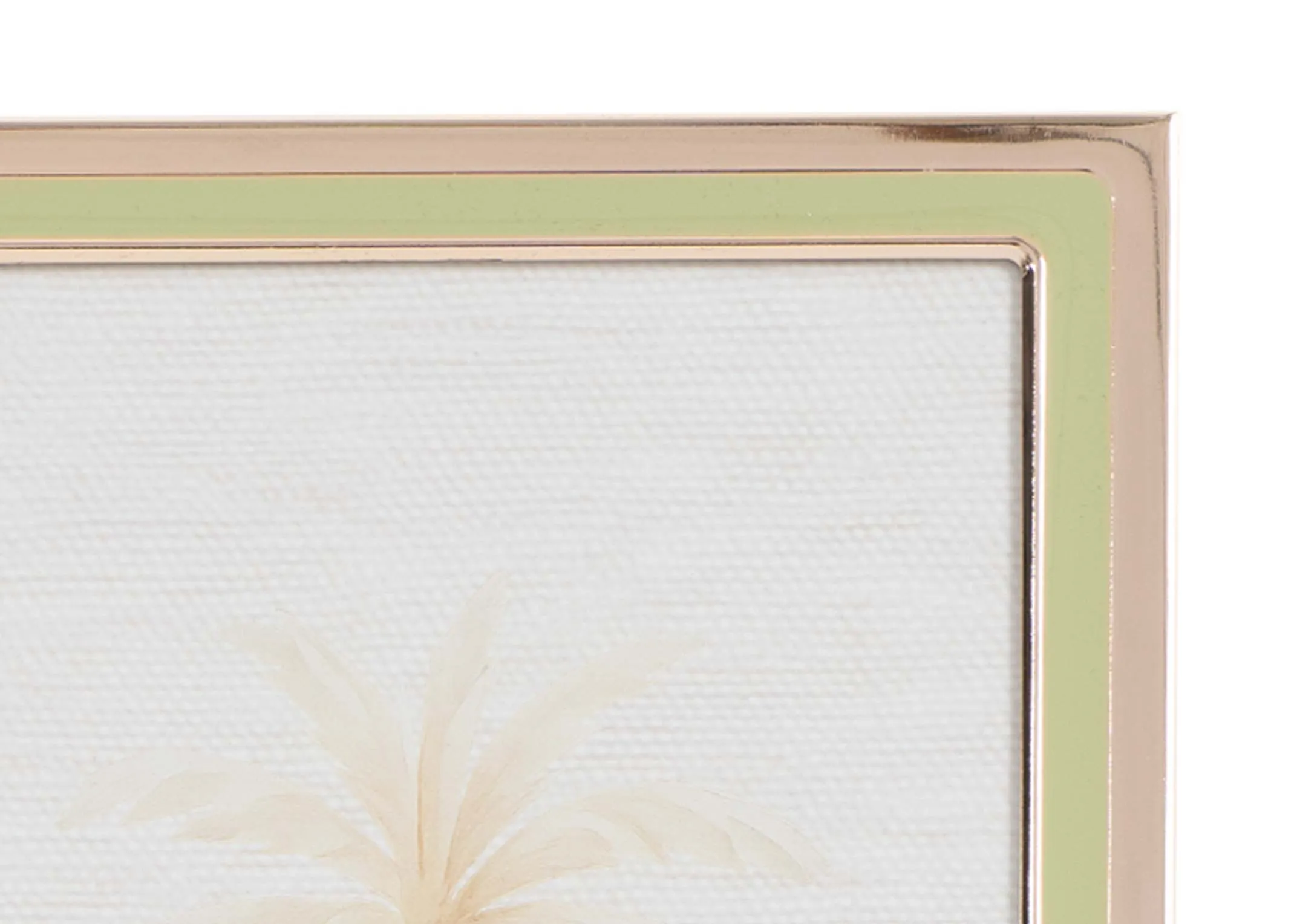 A gold and green photo frame from EZ Livings Palm range. Closeup of green and gold trim