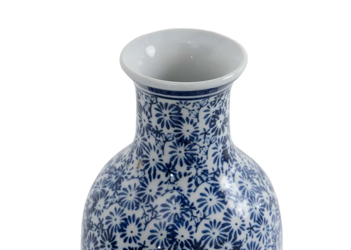 A blue and white vase fromEZ Livings Mist range. Closeup of white interior/