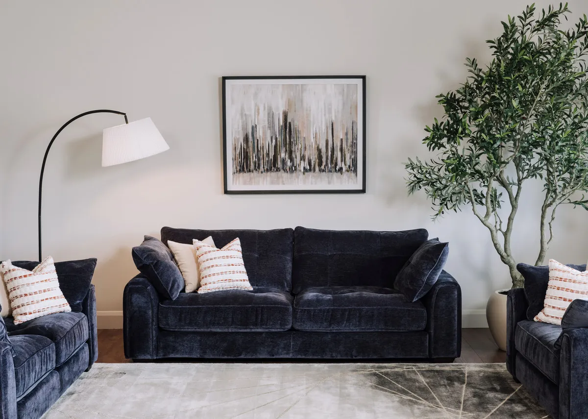 A lifestyle image of the Darcy sofa with Urban silence print