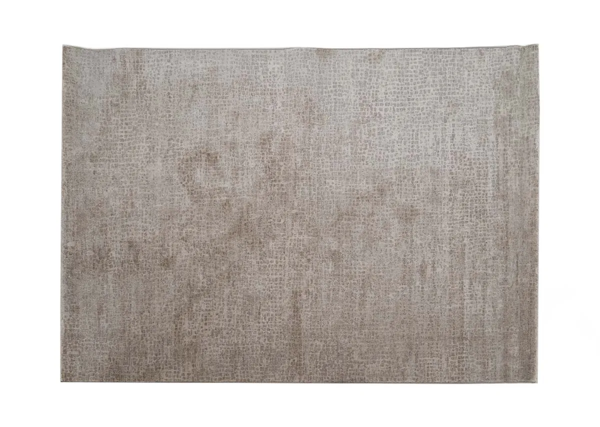 A beige and taupe distressed rug from EZ Livings Flowline range. Front view