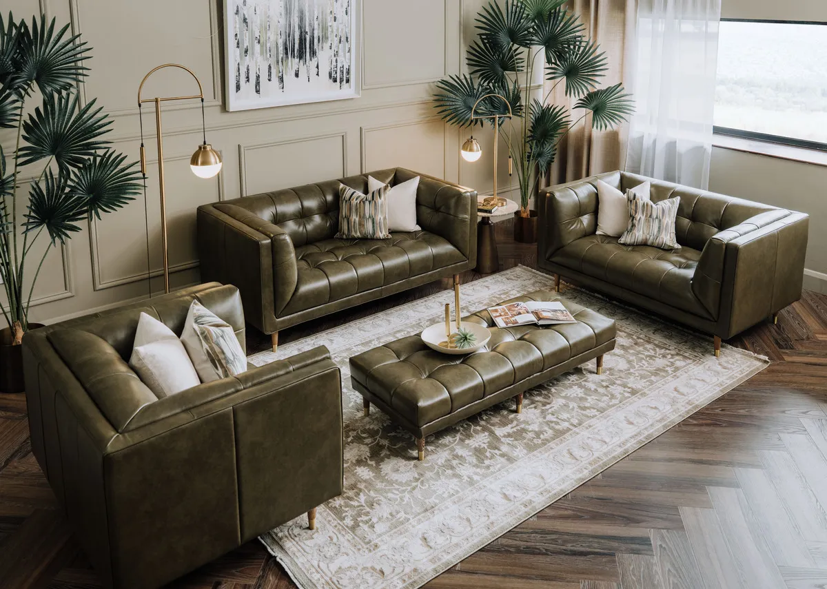 A lifestyle image of the Grace leather sofa in green with Arden