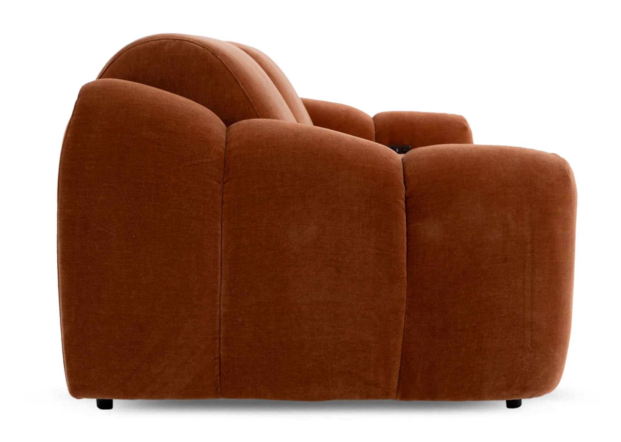 A rust orange 2 seater sofa from EZ Livings Eleanor range. Side view of seam tuft detail as sofa
