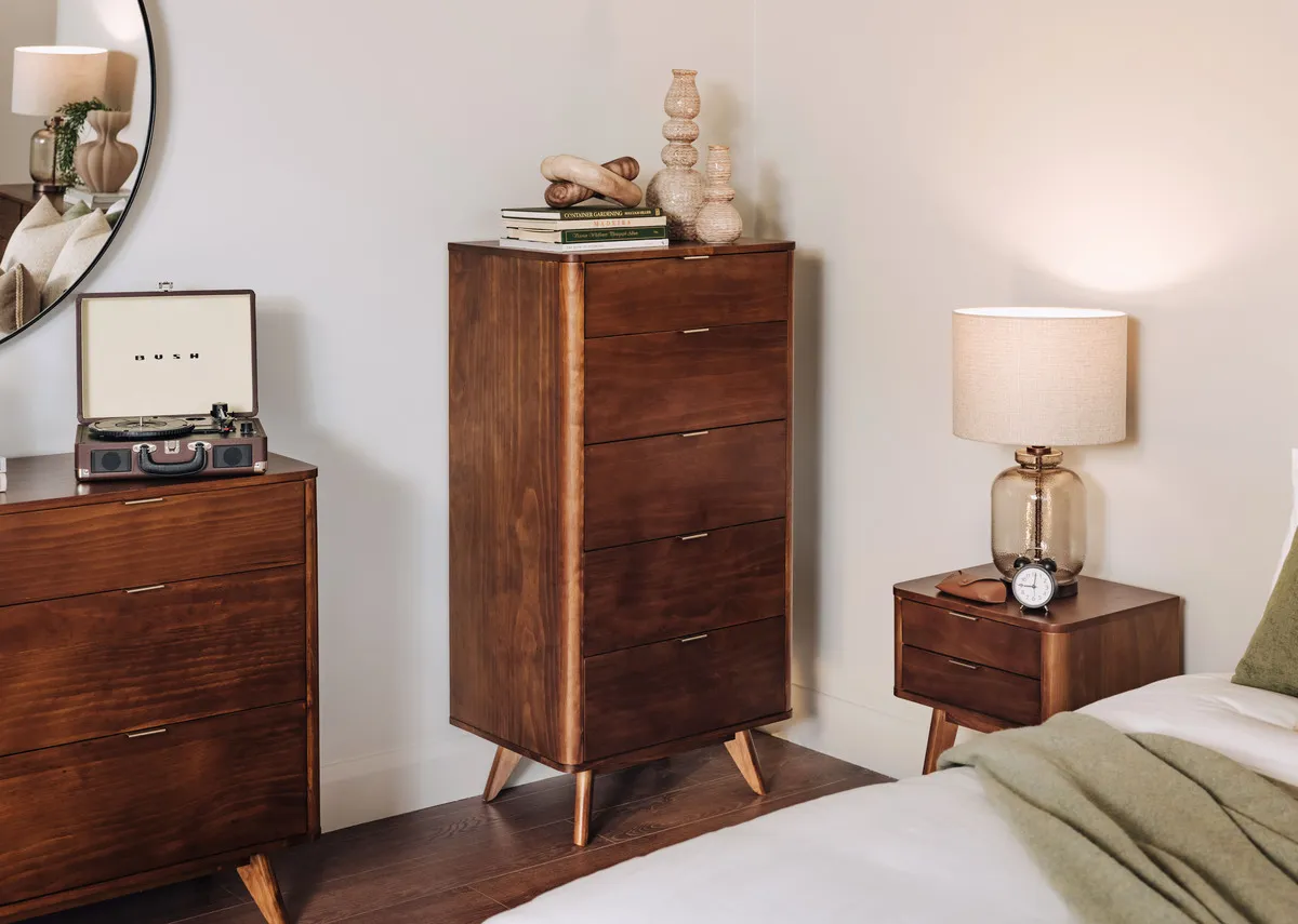 A .lifestyle image of the Velmora tallboy with dresser and locker