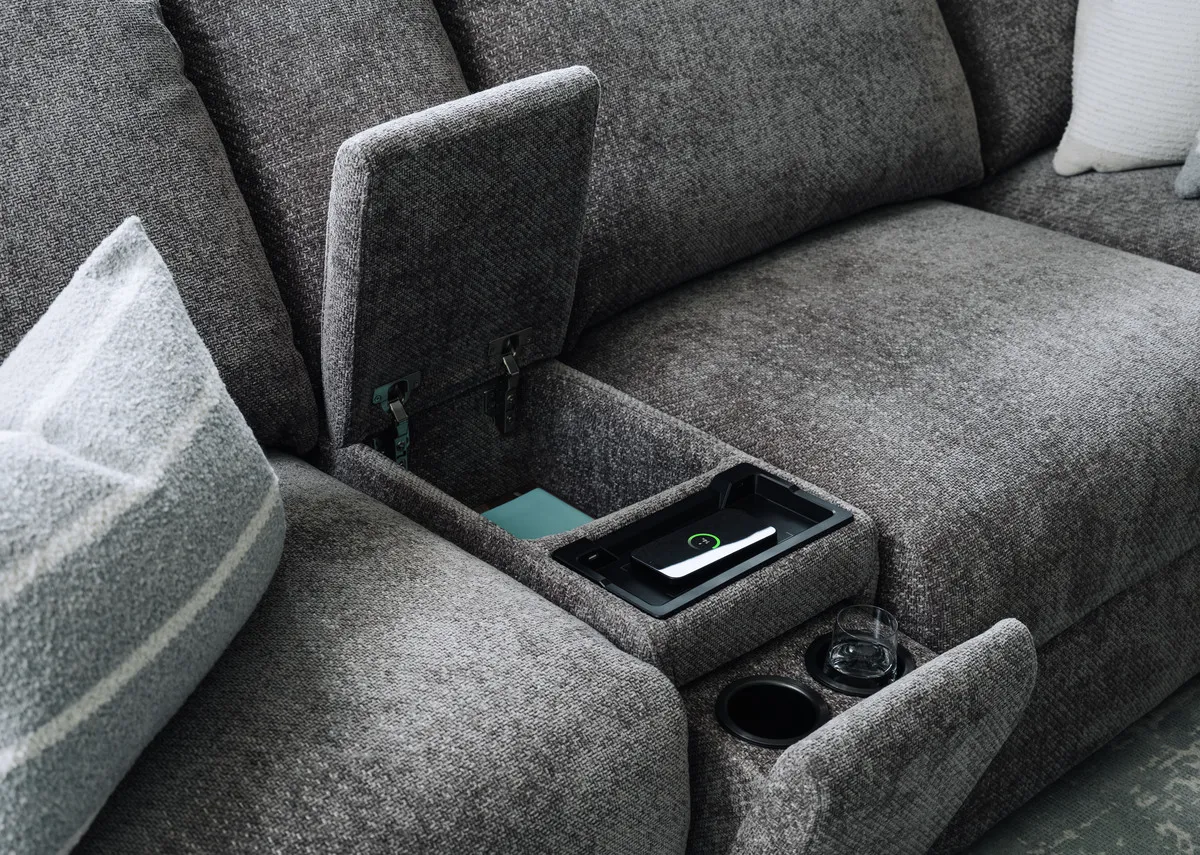 A lifestyle image of the Montero sofa with drinks holder inserted