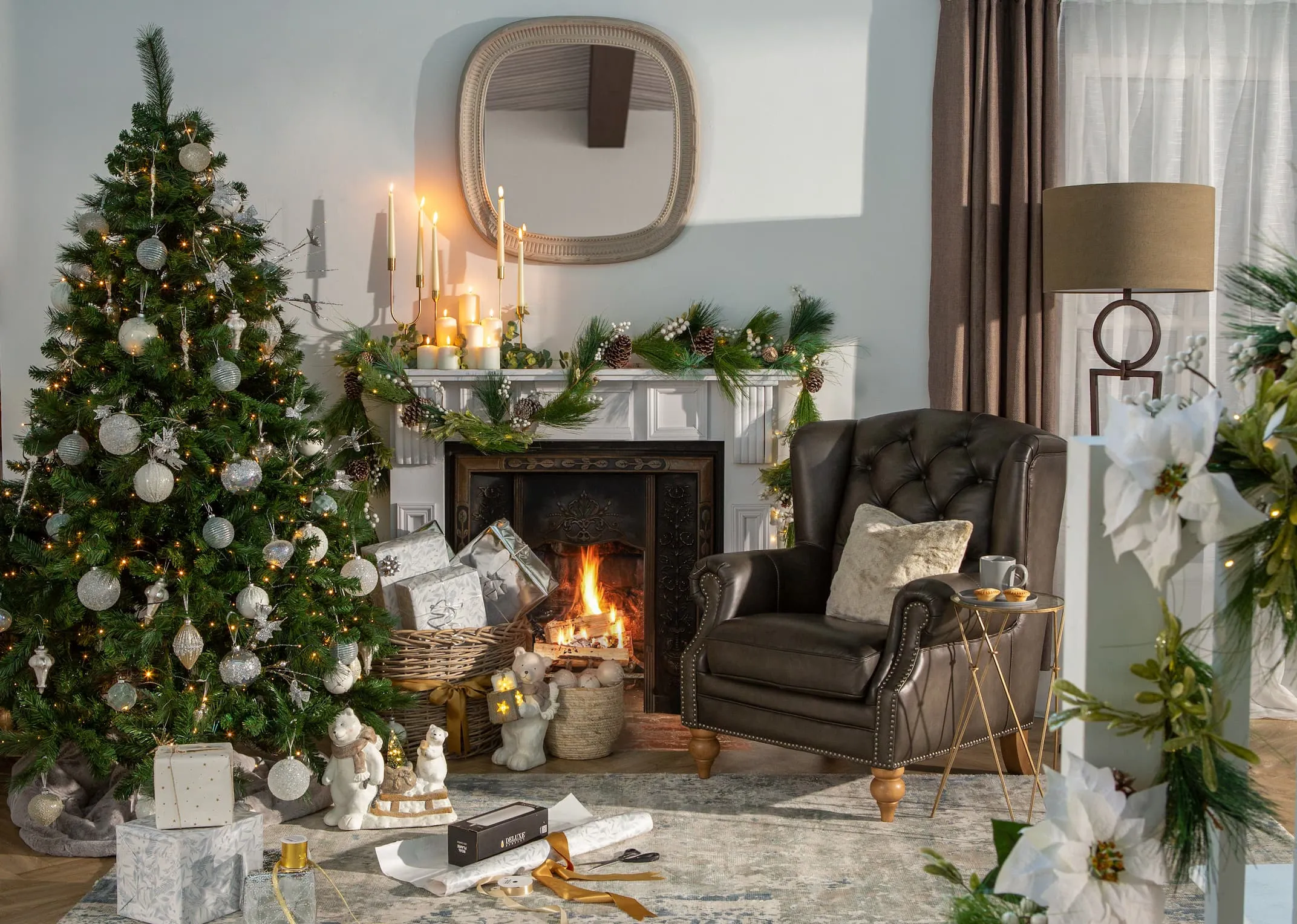 A lifestyle image of the Colorado tree with Adare Chair beside a fireplace