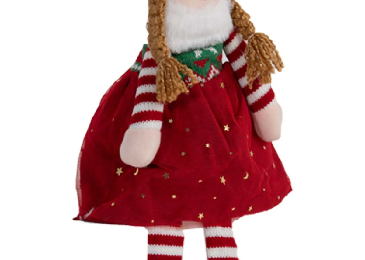 A fabric rag dool figurine with red skirt & hat from EZ Livings Christmas range. Closeup of skirt