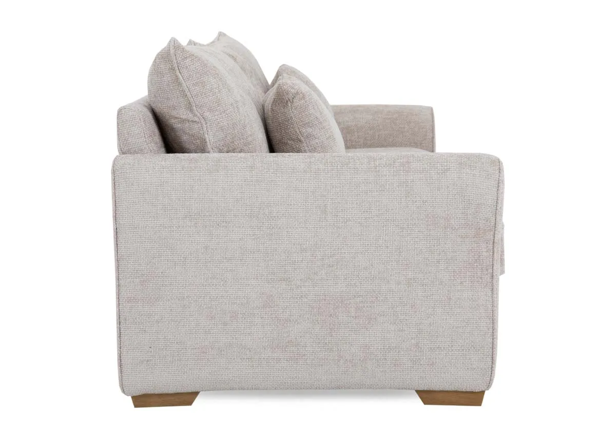 A 3 seater beige fabric sofa from EZ Livings Skyline range. Side veiw of low armrest.