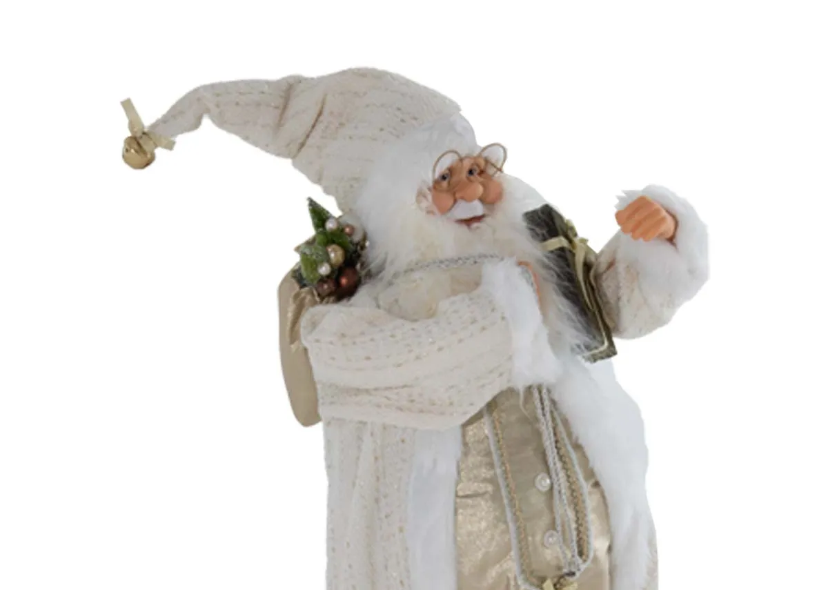 A white & gold Saint Nick figurine from EZ Livings Christmas range. Closeup of santa armed with gifts and wearing spectacles