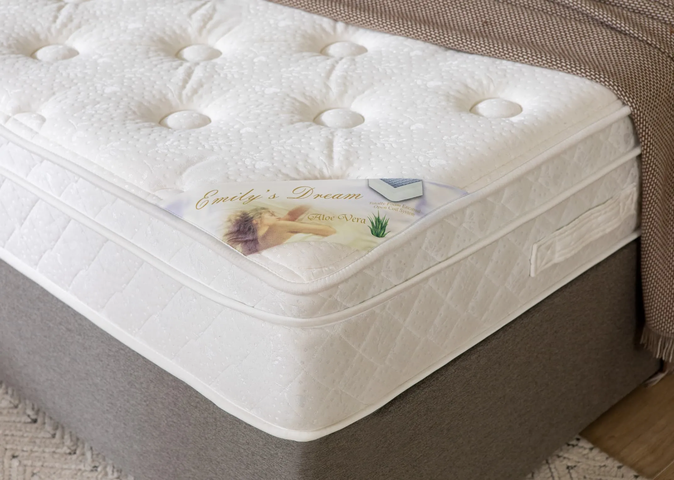A lifestyle image of the Emilys dream mattress on a Modena bed base