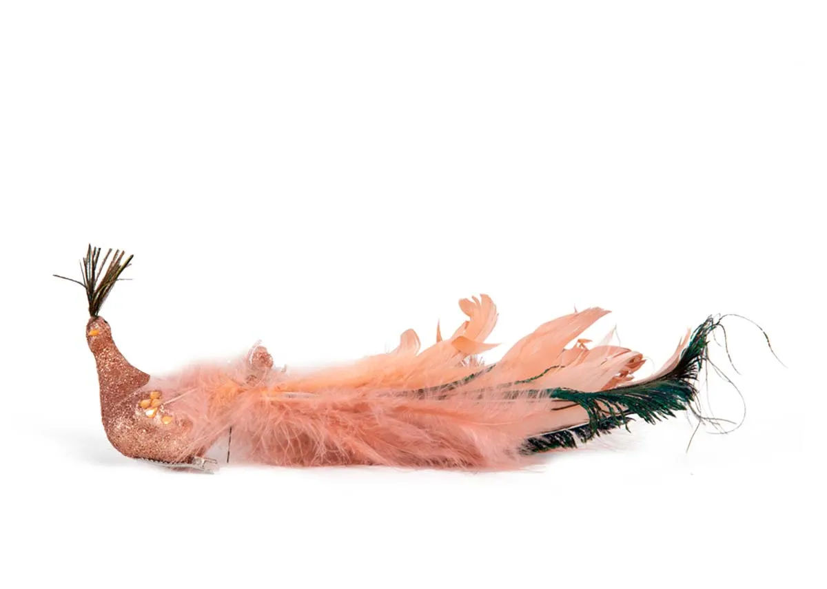 A pink champagne feather peacock decoration from EZ Livings Christmas range. Front view of sparkling body and green feathers beneath.