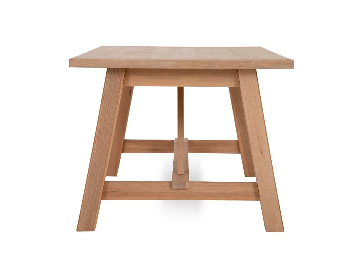 An oak dining table from EZ Livings Albany range. Side view of thick sturdy legs